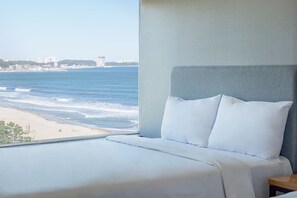 Premium bedding, desk, blackout drapes, soundproofing