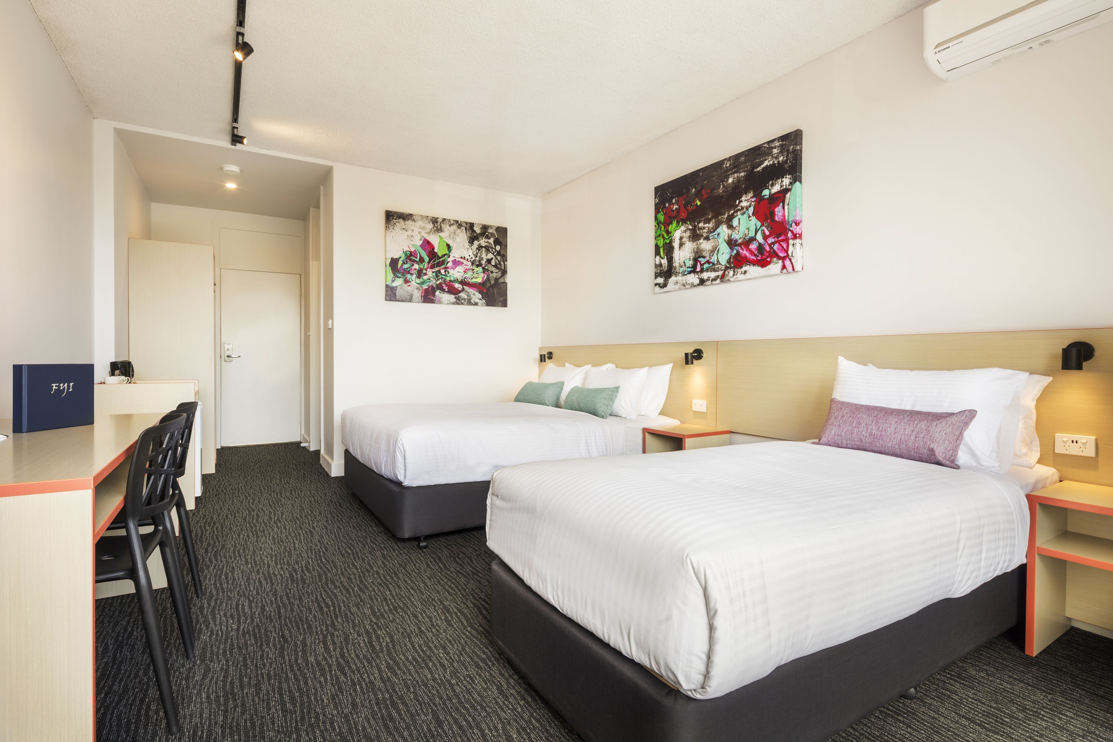 desk, laptop workspace, iron/ironing board, free cots/infant beds