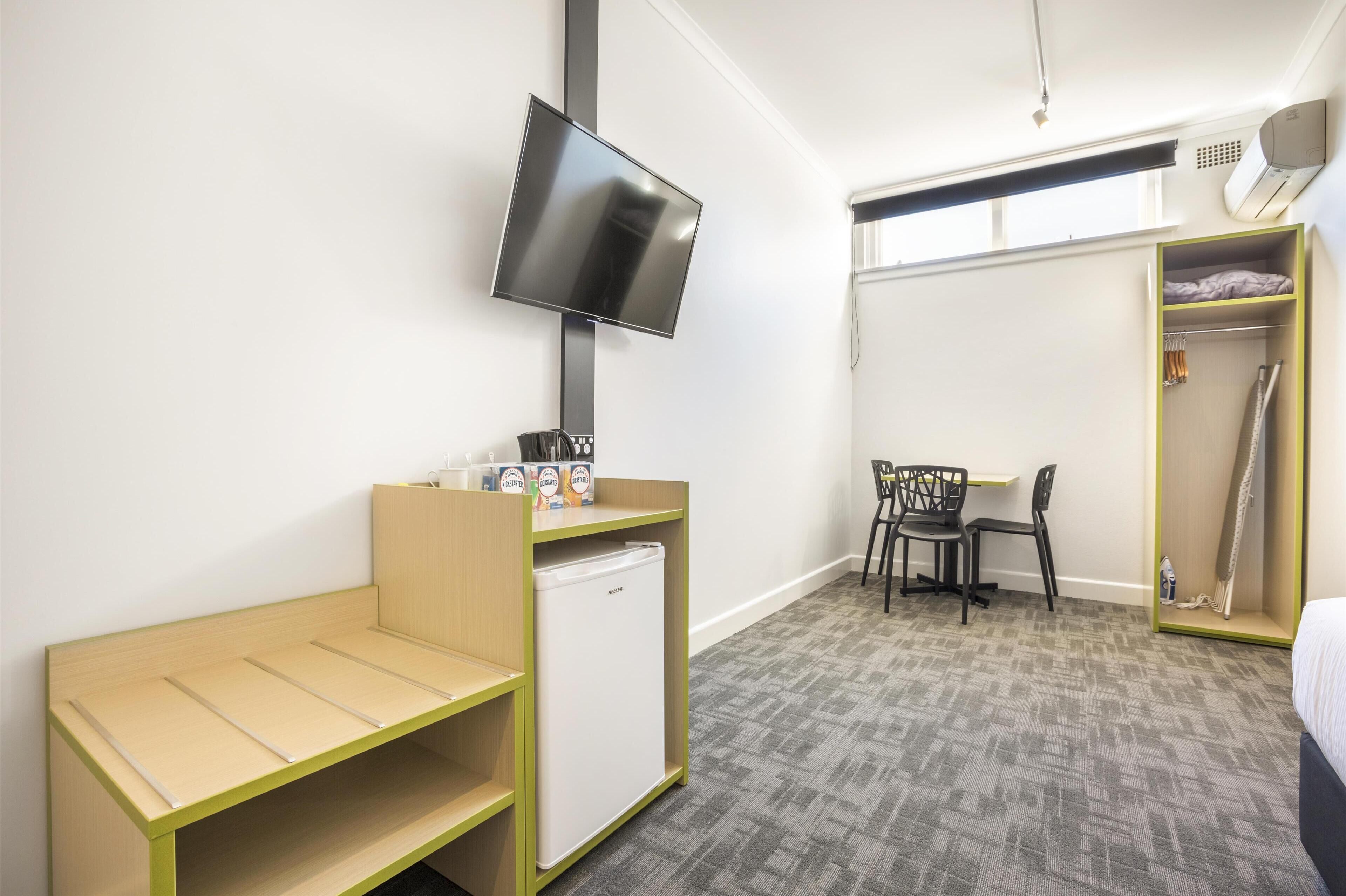 desk, laptop workspace, iron/ironing board, free cots/infant beds