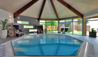 Indoor pool, open 7:00 AM to 2:00 PM, sun loungers