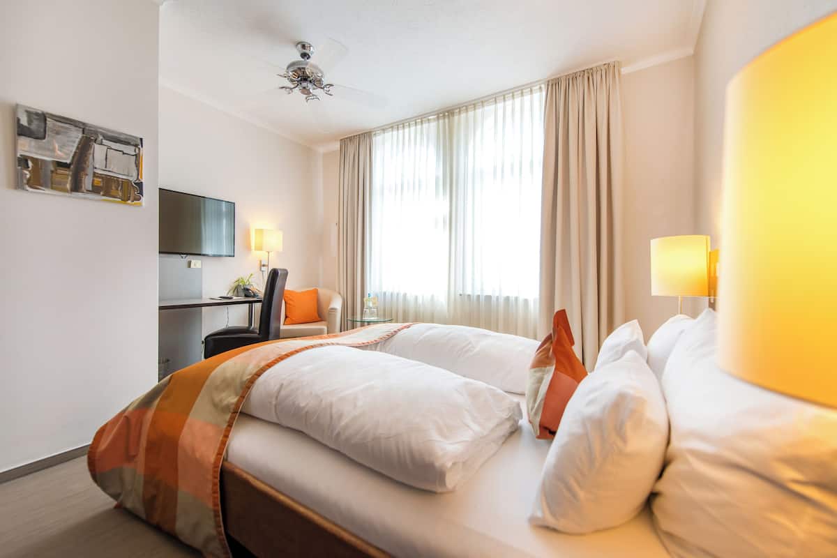 In-room safe, desk, blackout curtains, soundproofing
