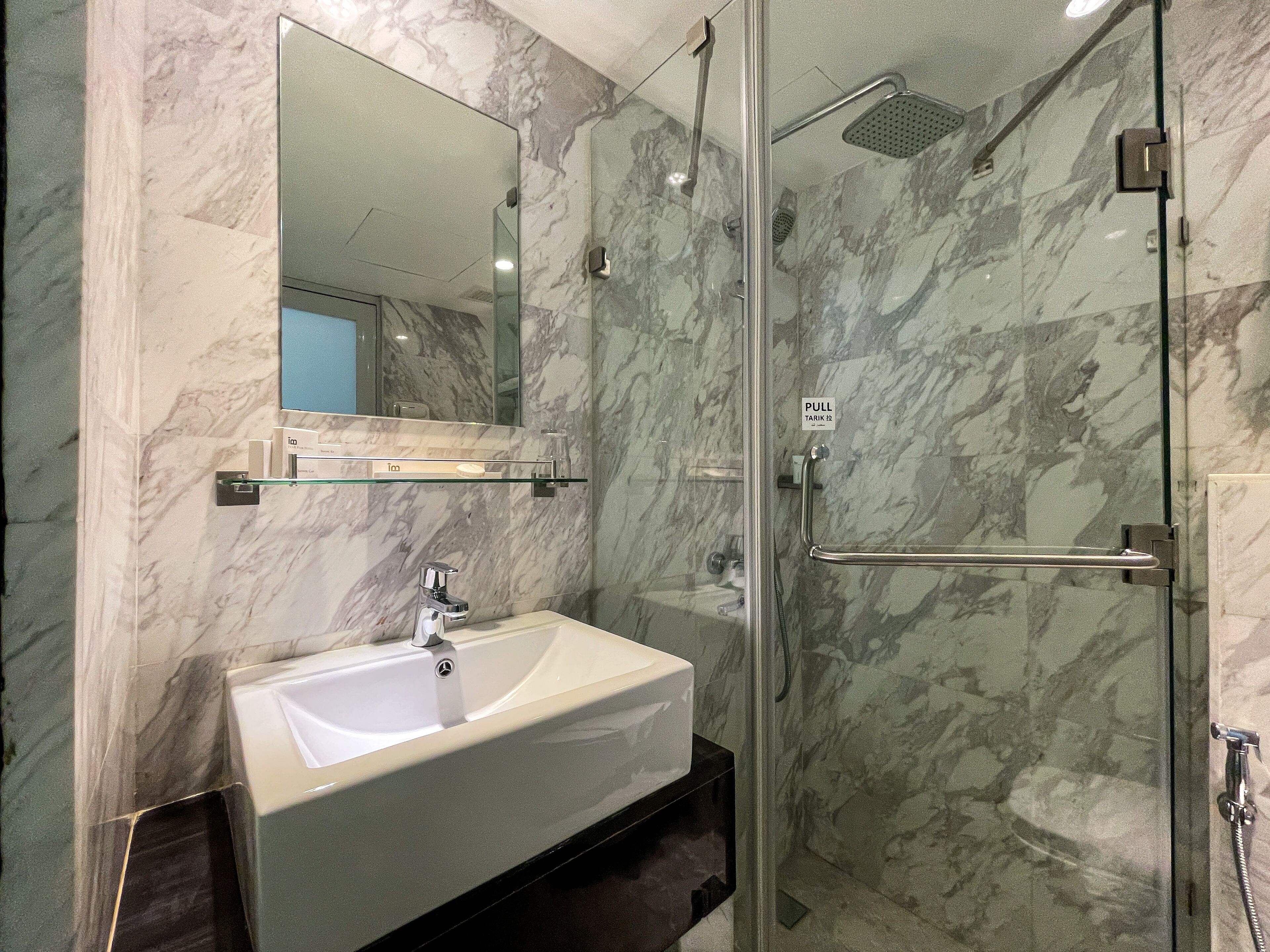 standard queen room | bathroom | shower, rainfall showerhead, free toiletries, hair dryer