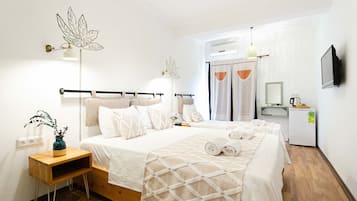 Superior Triple Room, Garden View | Seprai premium, minibar, kedap suara, dan Wi-Fi gratis