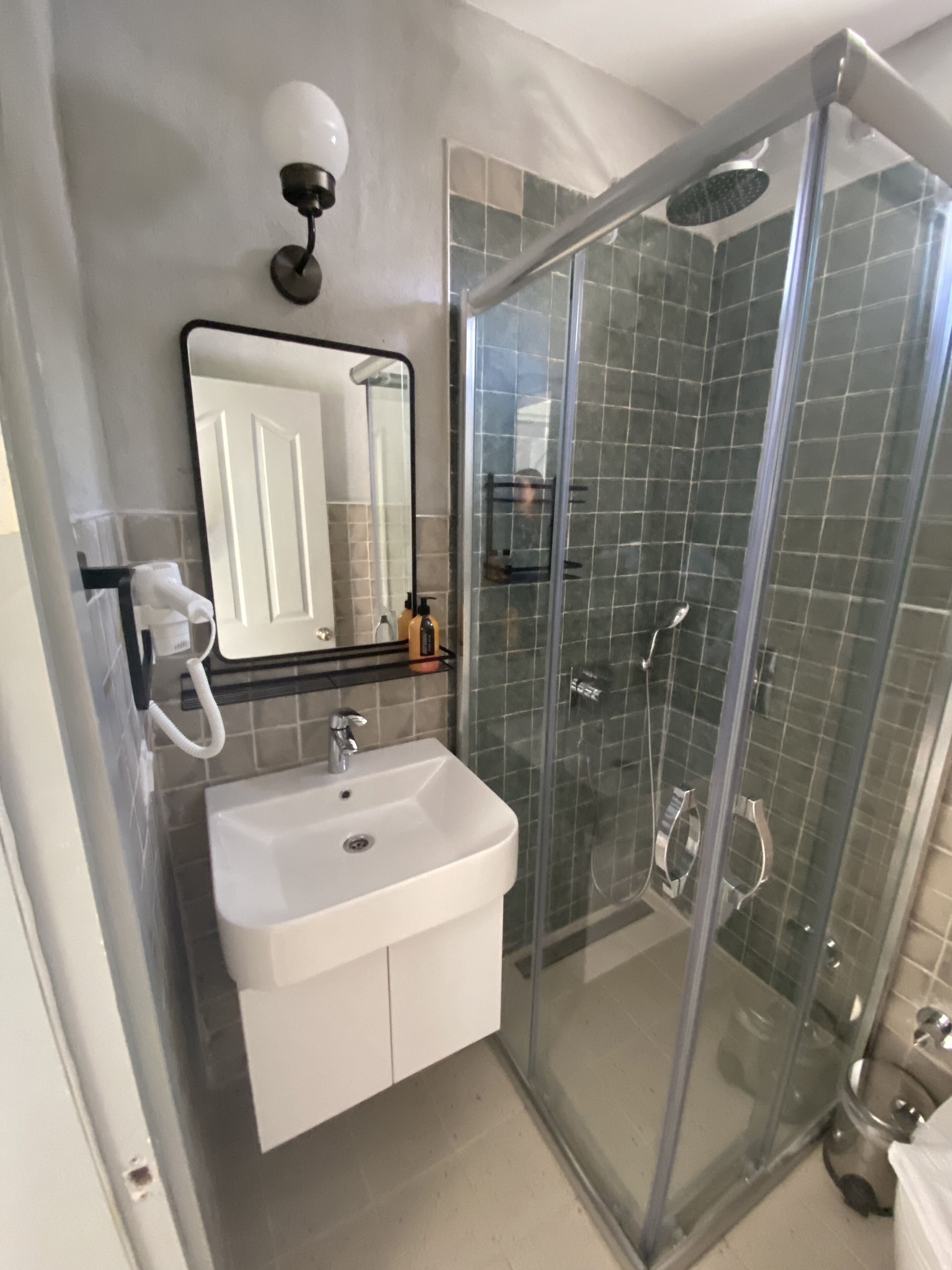 family suite | bathroom | shower, free toiletries, hair dryer, slippers