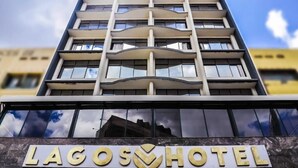 A hotel building with a sign that reads "Lagos Hotel". - Lagos Hotel (Nairobi)