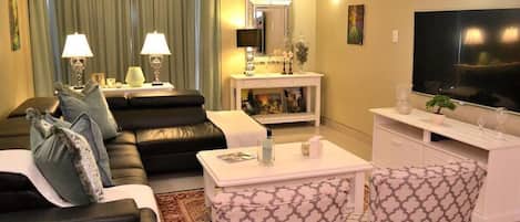 Apartment, 2 Bedrooms, Sea View | Living area | TV
