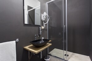 Deluxe Triple Room, Garden View | Bathroom | Shower, rainfall showerhead, free toiletries, hair dryer