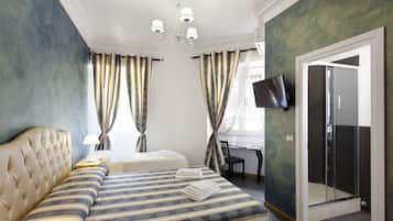 Deluxe Triple Room, Garden View | Premium bedding, minibar, desk, blackout curtains