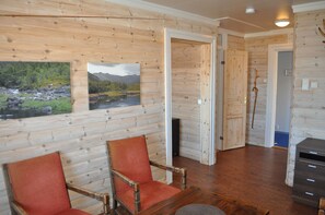 Familie suite, 3 slaapkamers, privébadkamer, uitzicht op zee (Suite 7) | Woonkamer