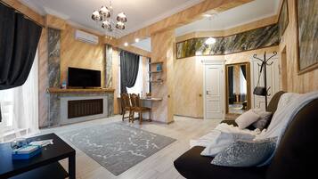 Superior Apartment | Living room | 40-inch flat-screen TV with cable channels, TV