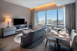 Executive Apartment, 1 Bedroom | Living area | LCD TV, tablet