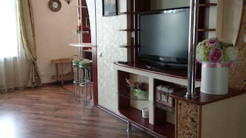 PaulMarie Apartments on Kyrova | Living room | Flat-screen TV