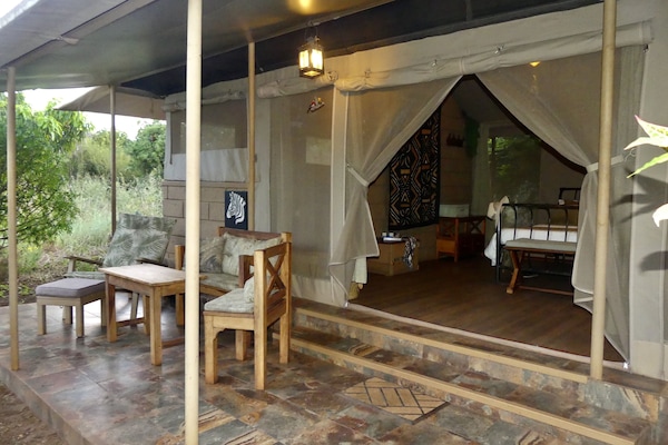 Luxury Tent, 1 Double Bed, Garden View, Garden Area | 1 bedroom, premium bedding, in-room safe, desk
