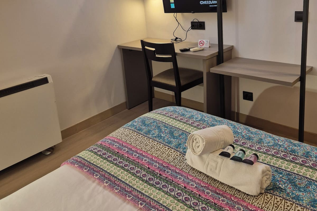 Desk, laptop workspace, blackout drapes, WiFi (free)