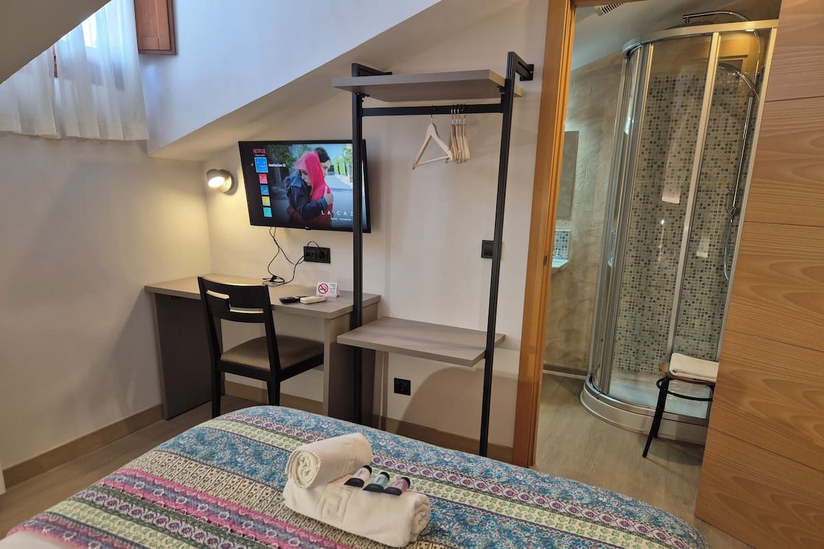 Desk, laptop workspace, blackout curtains, free WiFi