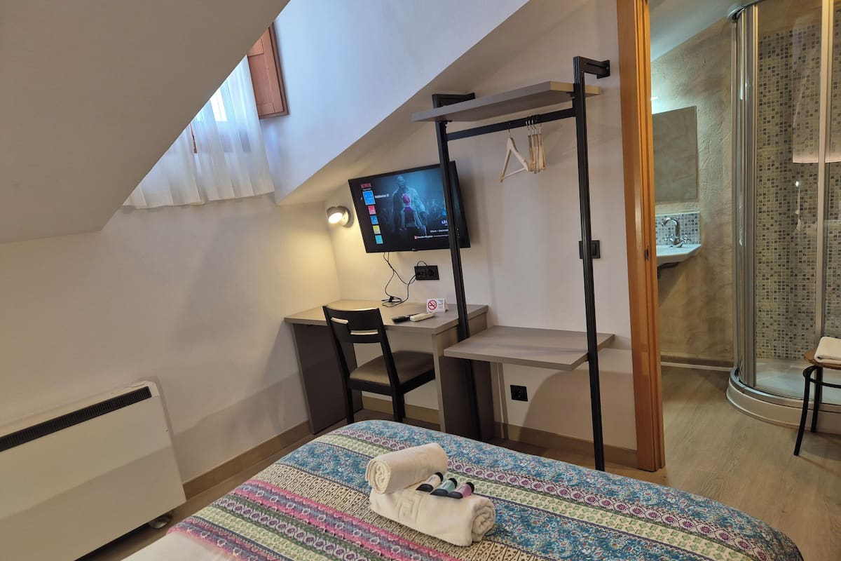 Desk, laptop workspace, blackout drapes, WiFi (free)