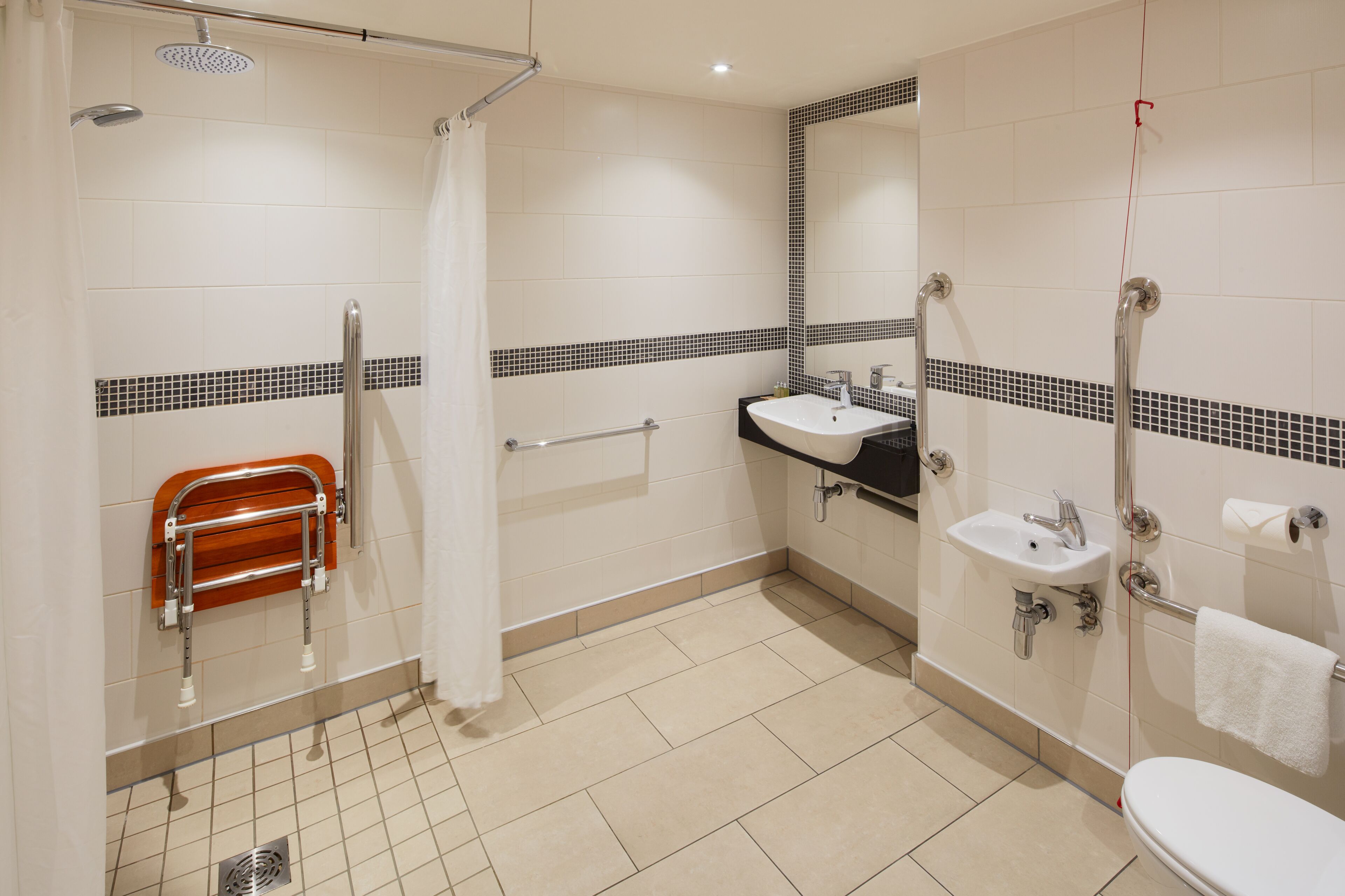 shower, designer toiletries, hair dryer, towels