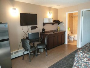 Chambre Simple, 1 grand lit, coin cuisine