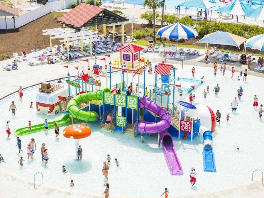 A water park with multiple slides and play structures.
