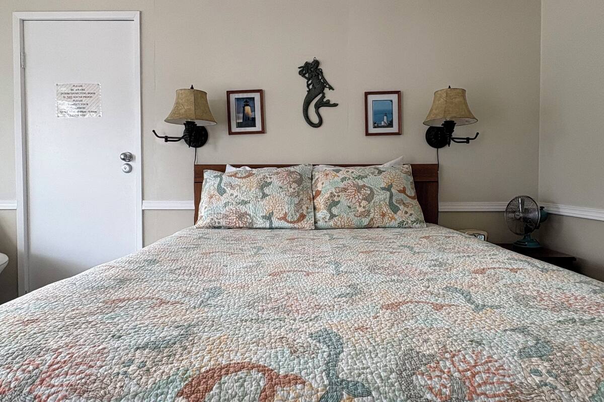 Premium bedding, pillow-top beds, desk, laptop workspace