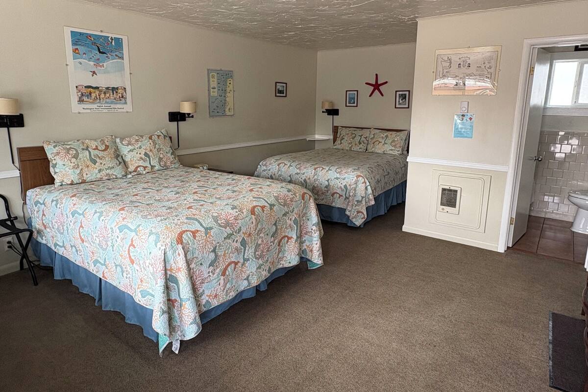 Premium bedding, pillow-top beds, desk, laptop workspace