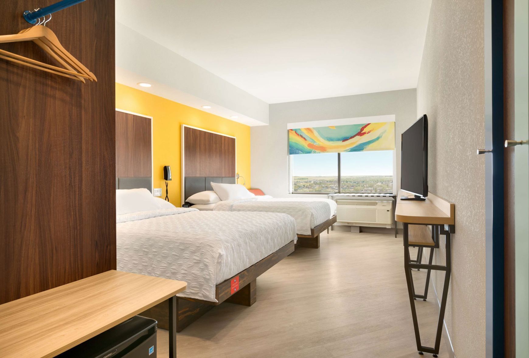 In-room safe, desk, blackout drapes, free cribs/infant beds