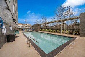 Outdoor pool, open 8 AM to 11 PM, sun loungers