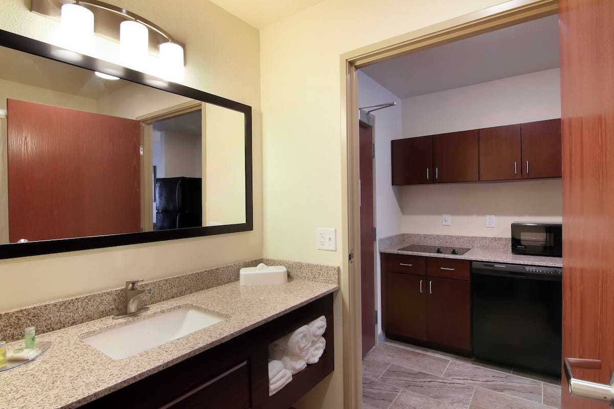 suite, multiple beds, non smoking (extended stay) | in-room safe, desk, laptop workspace, iron/ironing board