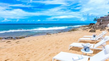 On the beach, beach towels