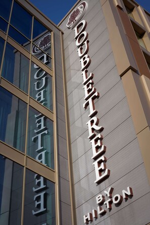 A hotel sign with the name "DoubleTree by Hilton".