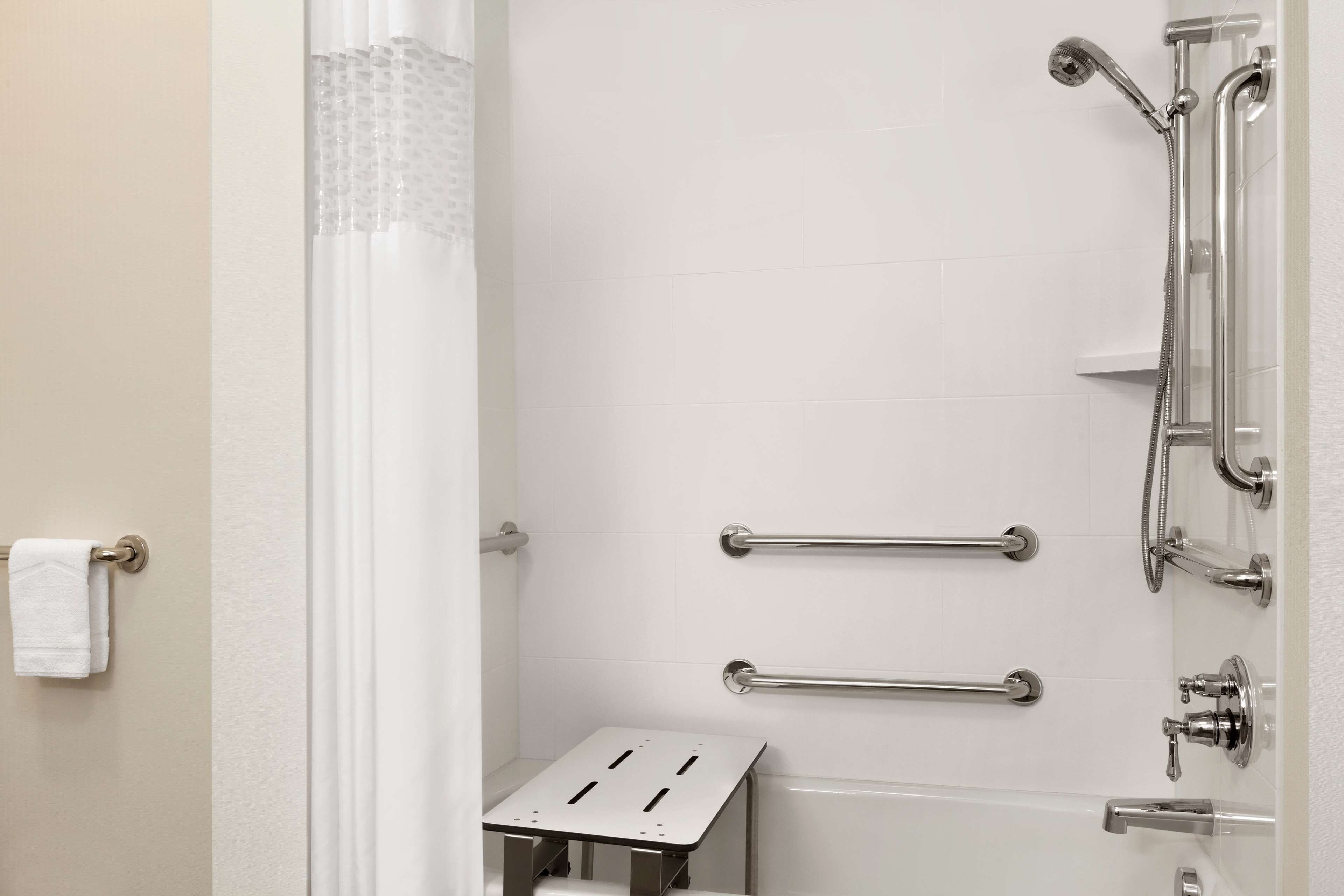 studio, 1 king bed with sofa bed, accessible, bathtub (mobility & hearing) | bathroom | combined shower/bathtub, free toiletries, hair dryer, towels