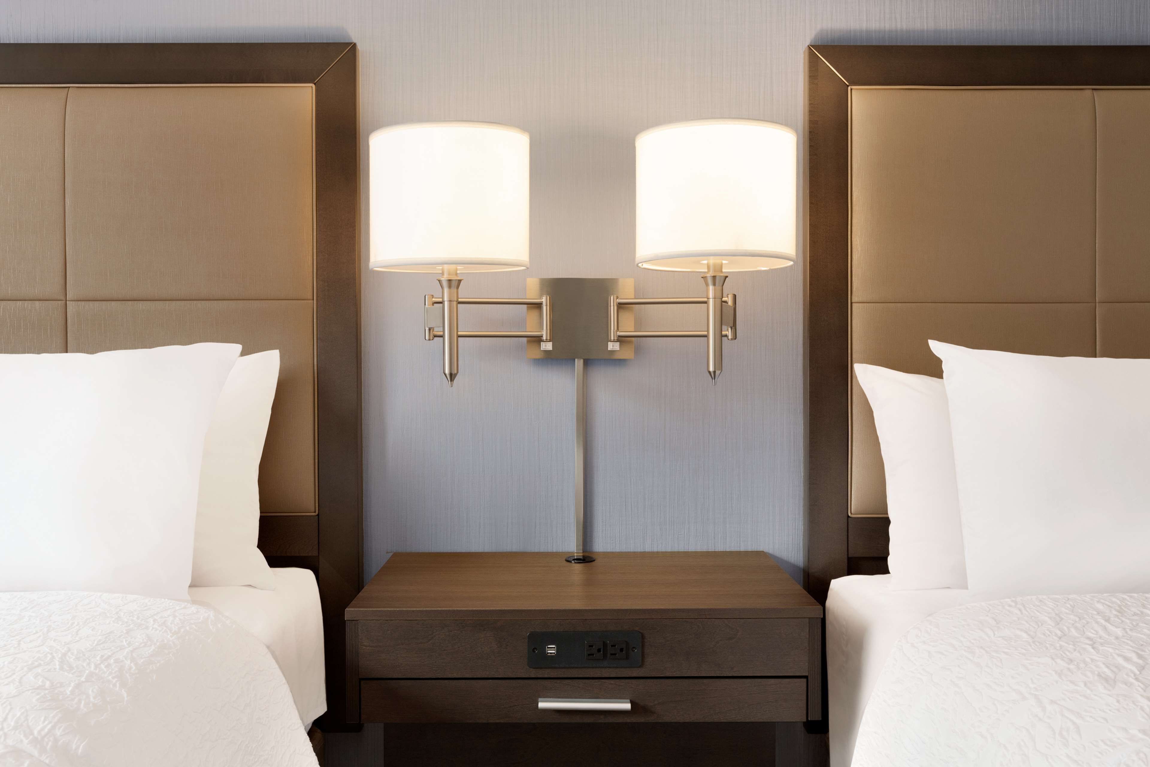 room, 2 queen beds, refrigerator | desk, blackout curtains, iron/ironing board, free cots/infant beds