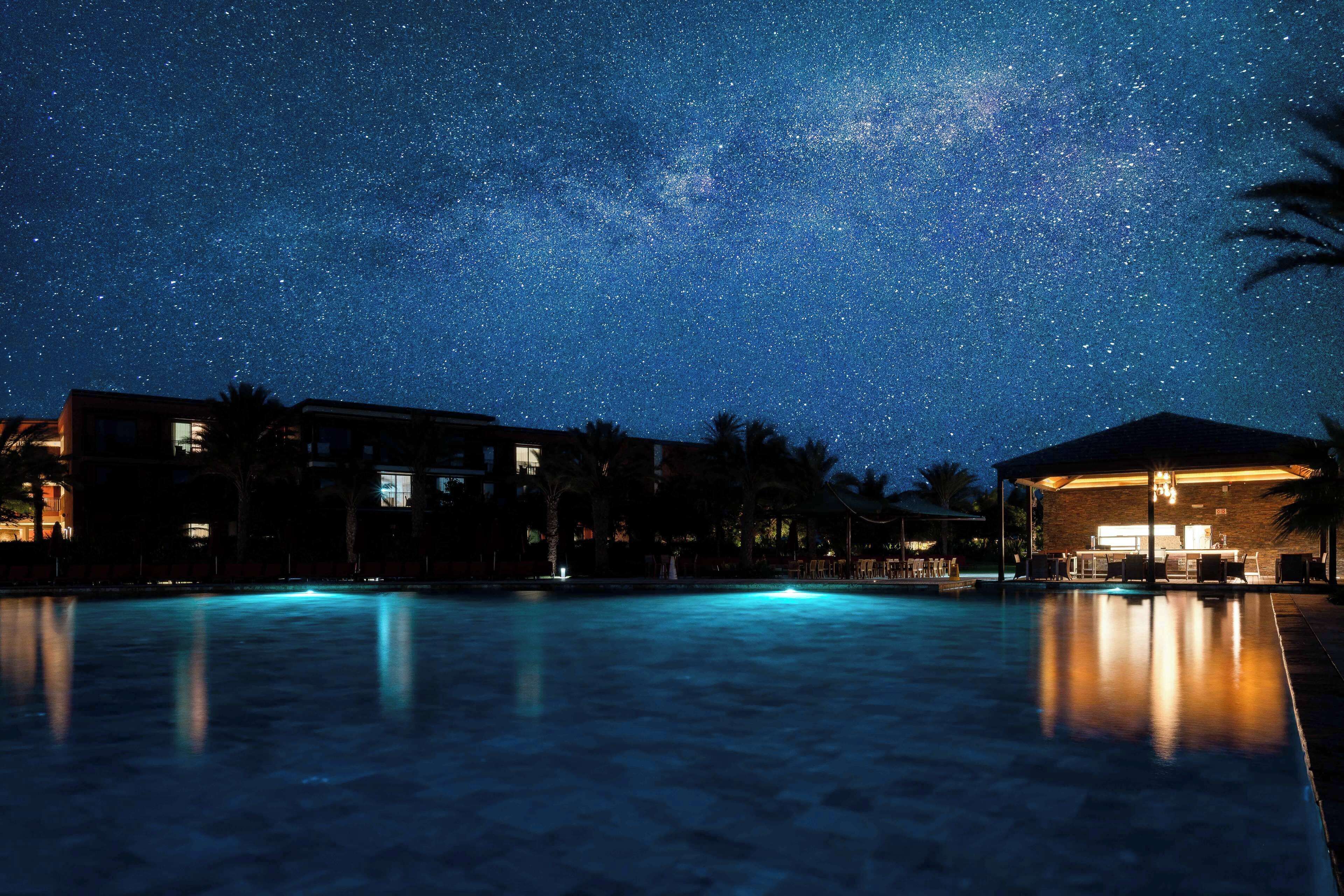 2 outdoor pools, open 9:00 AM to 6:00 PM, pool umbrellas, pool loungers