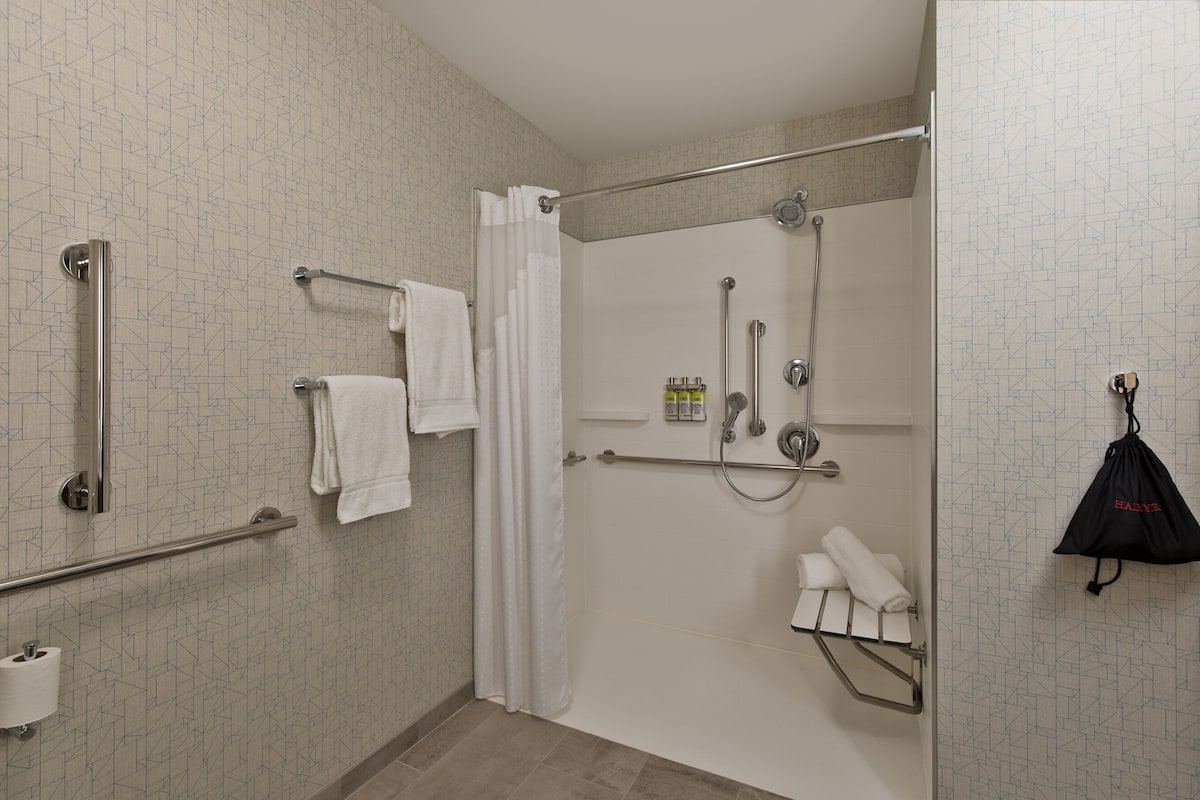 separate bathtub and shower, free toiletries, hair dryer, towels