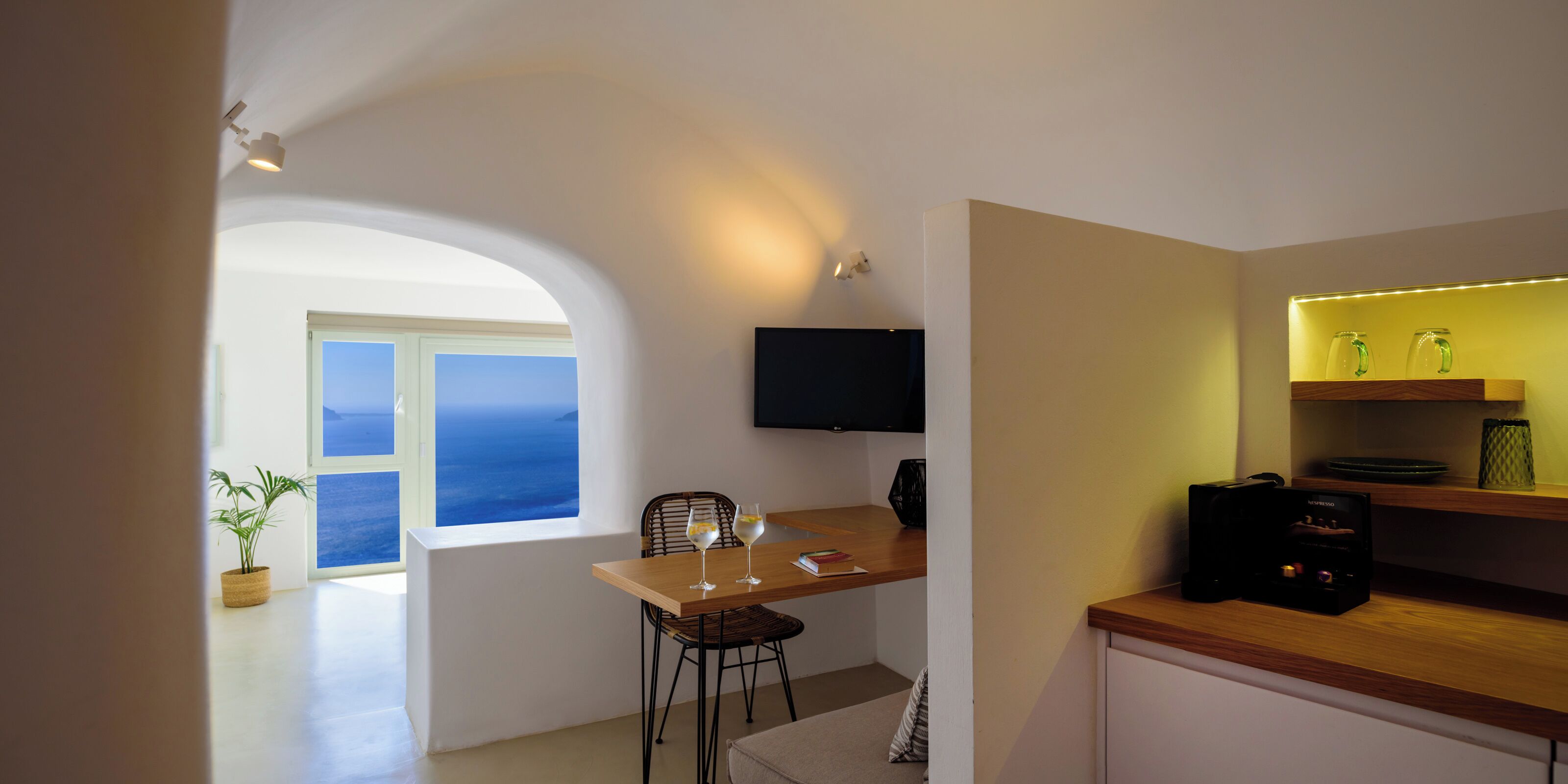 suite, hot tub, sea view (king, outdoor hot tub) | living area | 32-inch flat-screen tv with satellite channels, tv