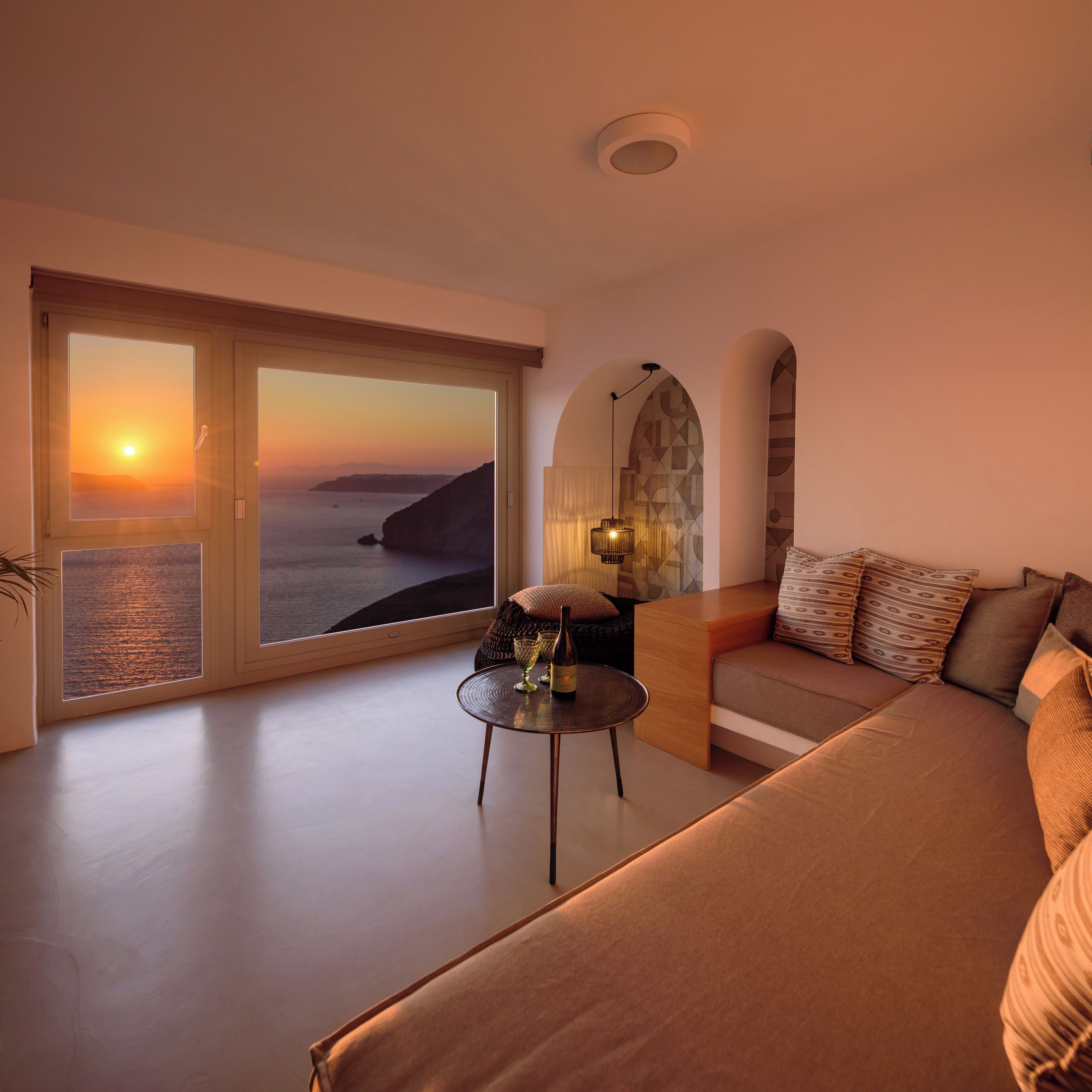 suite, hot tub, sea view (king, outdoor hot tub) | living area | 32-inch flat-screen tv with satellite channels, tv