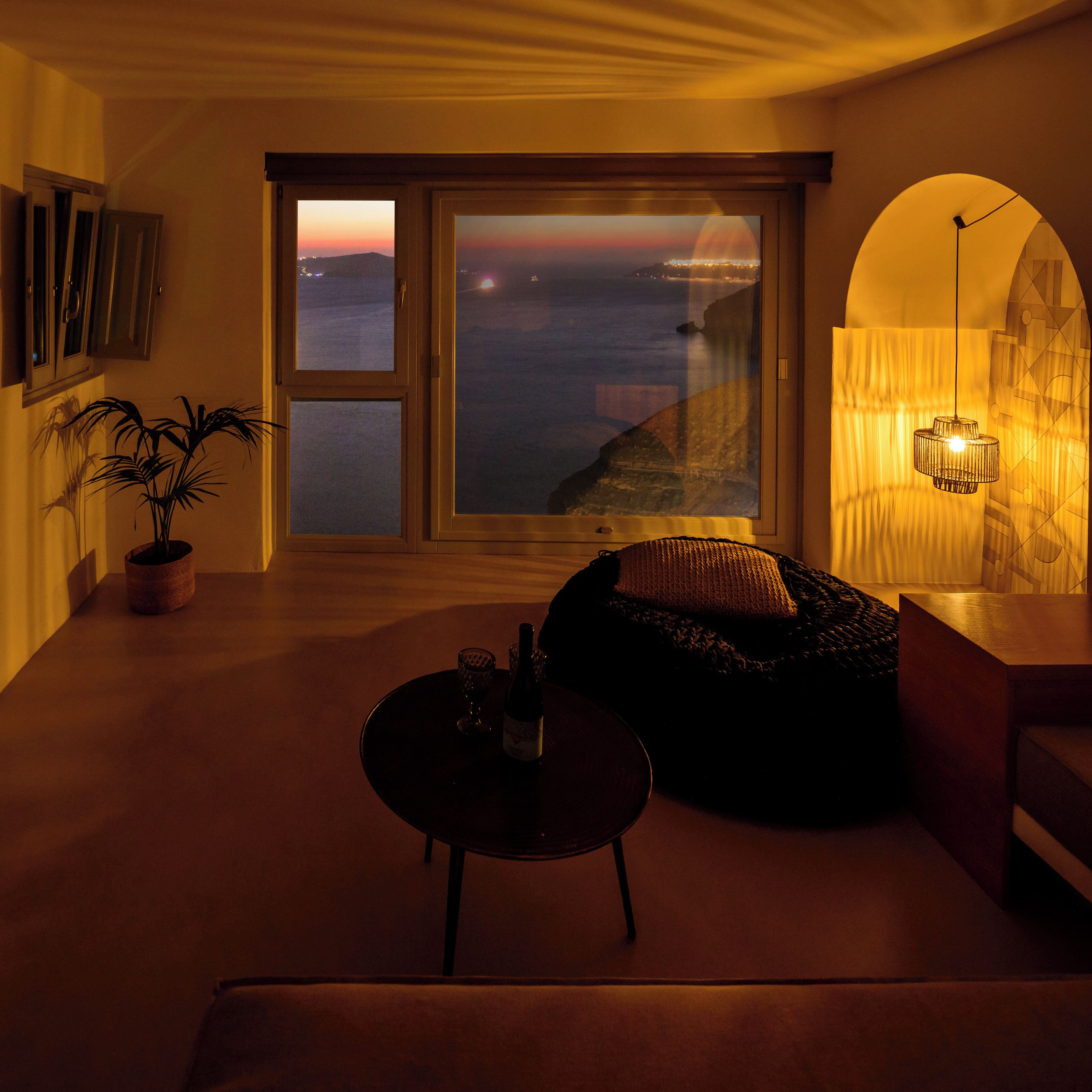 suite, hot tub, sea view (king, outdoor hot tub) | living area | 32-inch flat-screen tv with satellite channels, tv