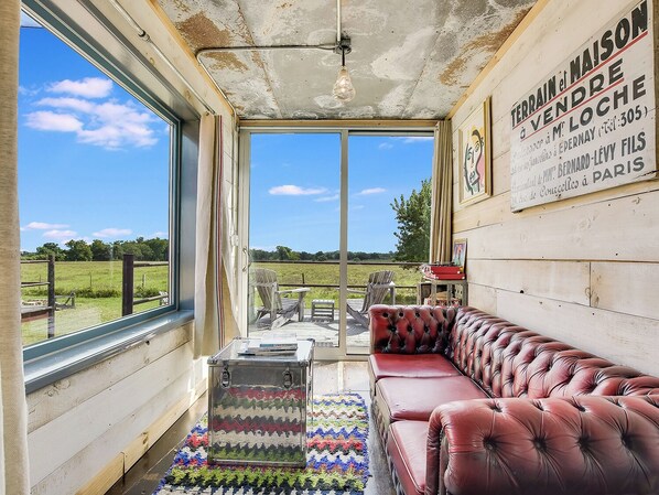 Houze VI | Living area - Flophouze Shipping Container Hotel (Round Top)