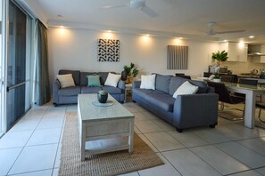 2 Bedroom Apartment Hibiscus 001 | Living area | Flat-screen TV, DVD player - Beach Lodges (Whitsundays)