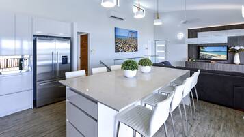 3 Bedroom Villa 19 | Private kitchen | Full-size fridge, microwave, oven, stovetop