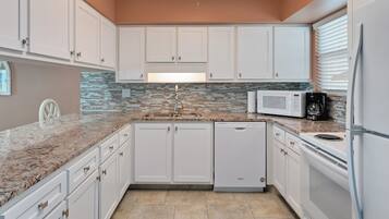 Premium Condo, 2 Bedrooms, Oceanfront | Private kitchen | Fridge, microwave, oven, stovetop