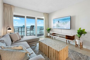 Premium Condo, 2 Bedrooms, Oceanfront | Living area | 50-inch flat-screen TV with cable channels, TV - Paradise Beach Club by Happy Palm Stays (Satellite Beach)