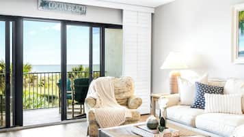 Direct Oceanfront Two-Bedroom Deluxe Condo - Unit 207 | Living area | Flat-screen TV
