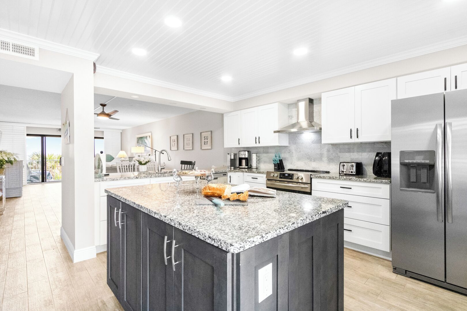 Direct Oceanfront Two-Bedroom Deluxe Condo - Unit 207 | Private kitchen | Fridge, microwave, oven, coffee/tea maker