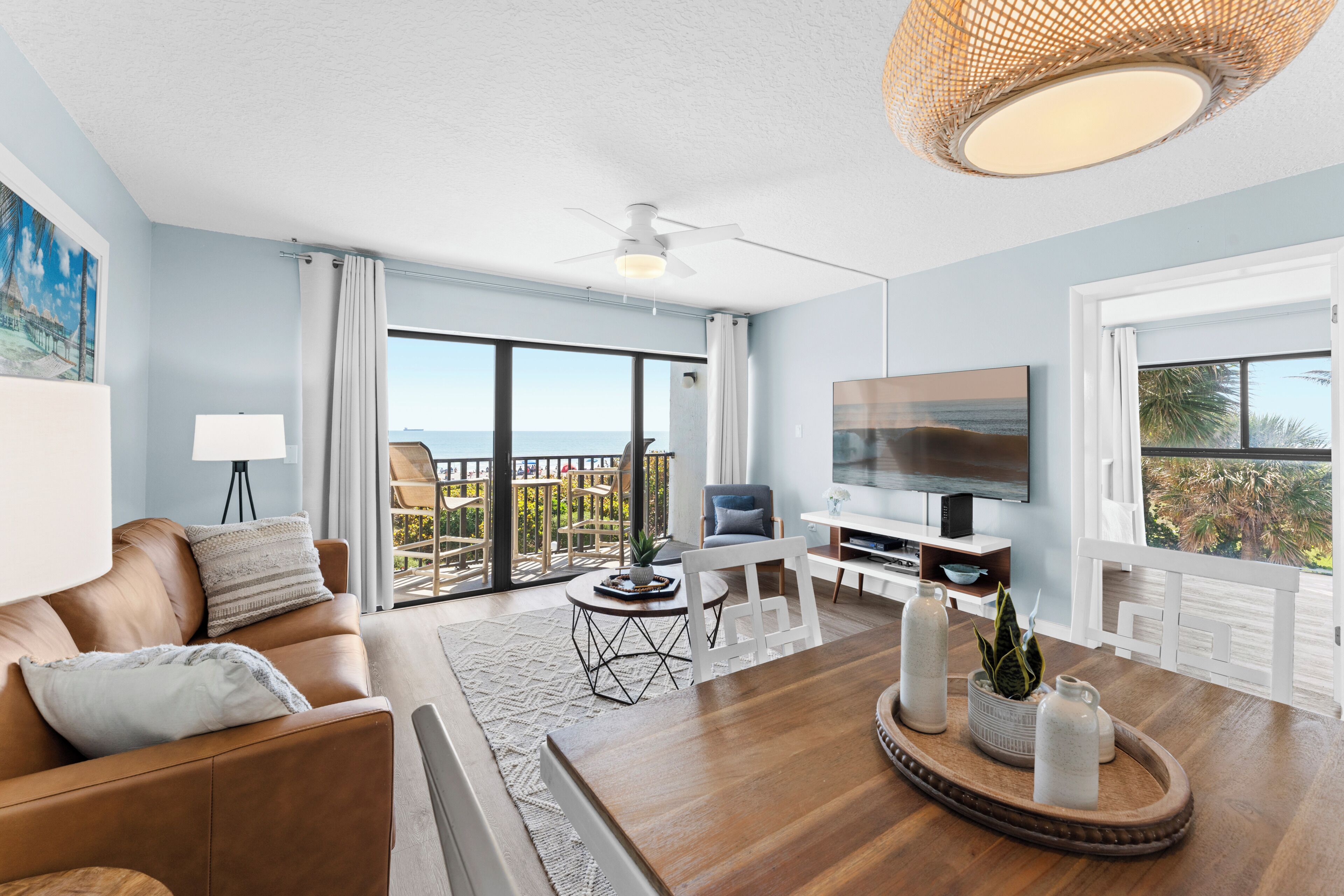 Corner Two-Bedroom Apartment - Direct Oceanfront - Unit #306 | Living area | Flat-screen TV