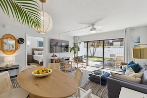 Deluxe Two-Bedroom Poolside Walkout Condo - Ground Floor - Unit #104 | Living area | Flat-screen TV