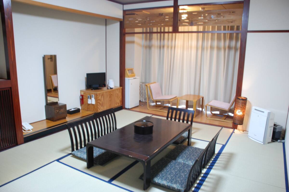 japanese-style room, shared bathroom | in-room safe, desk, free wifi