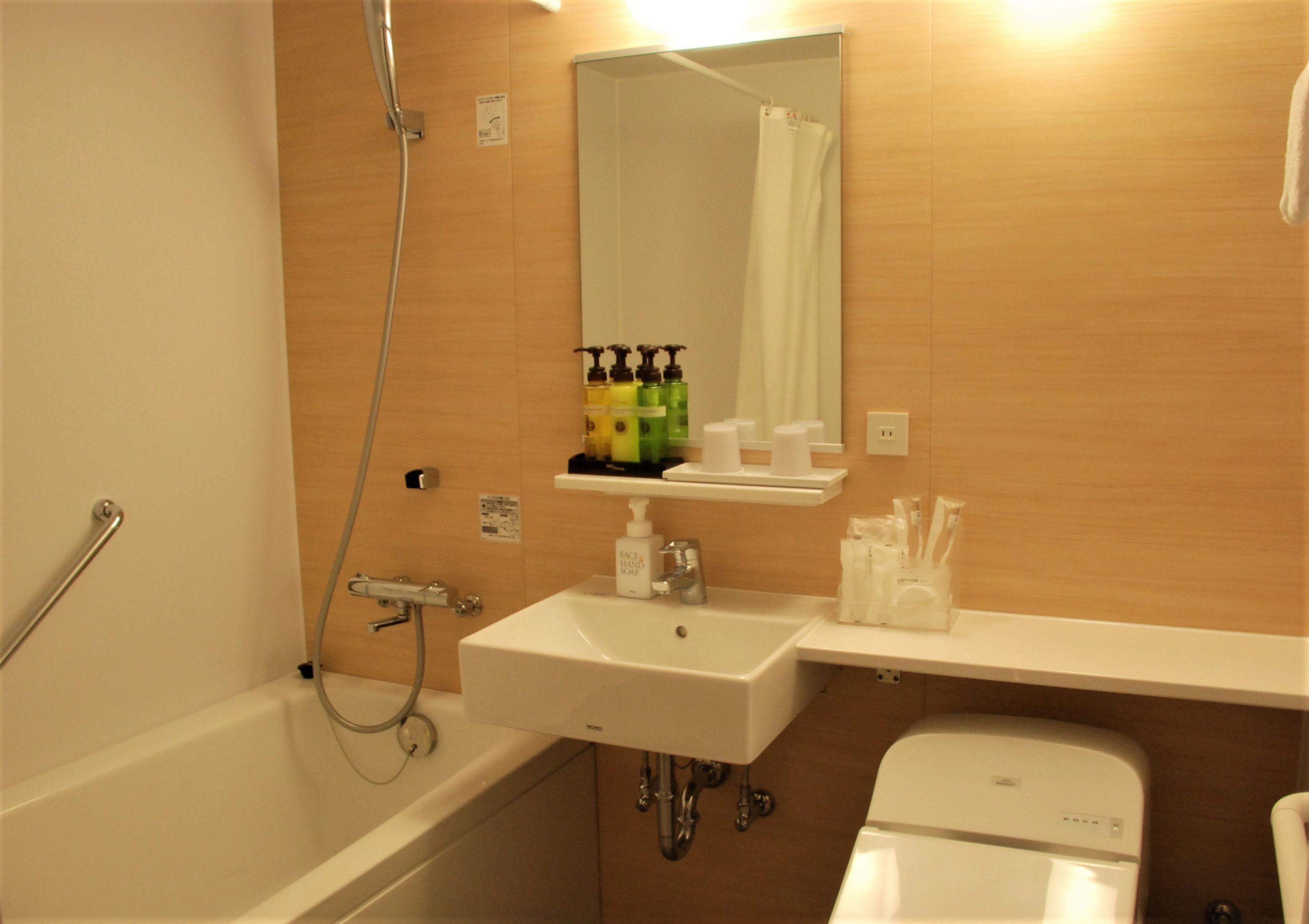 deluxe room | bathroom | free toiletries, hair dryer, slippers, bidet