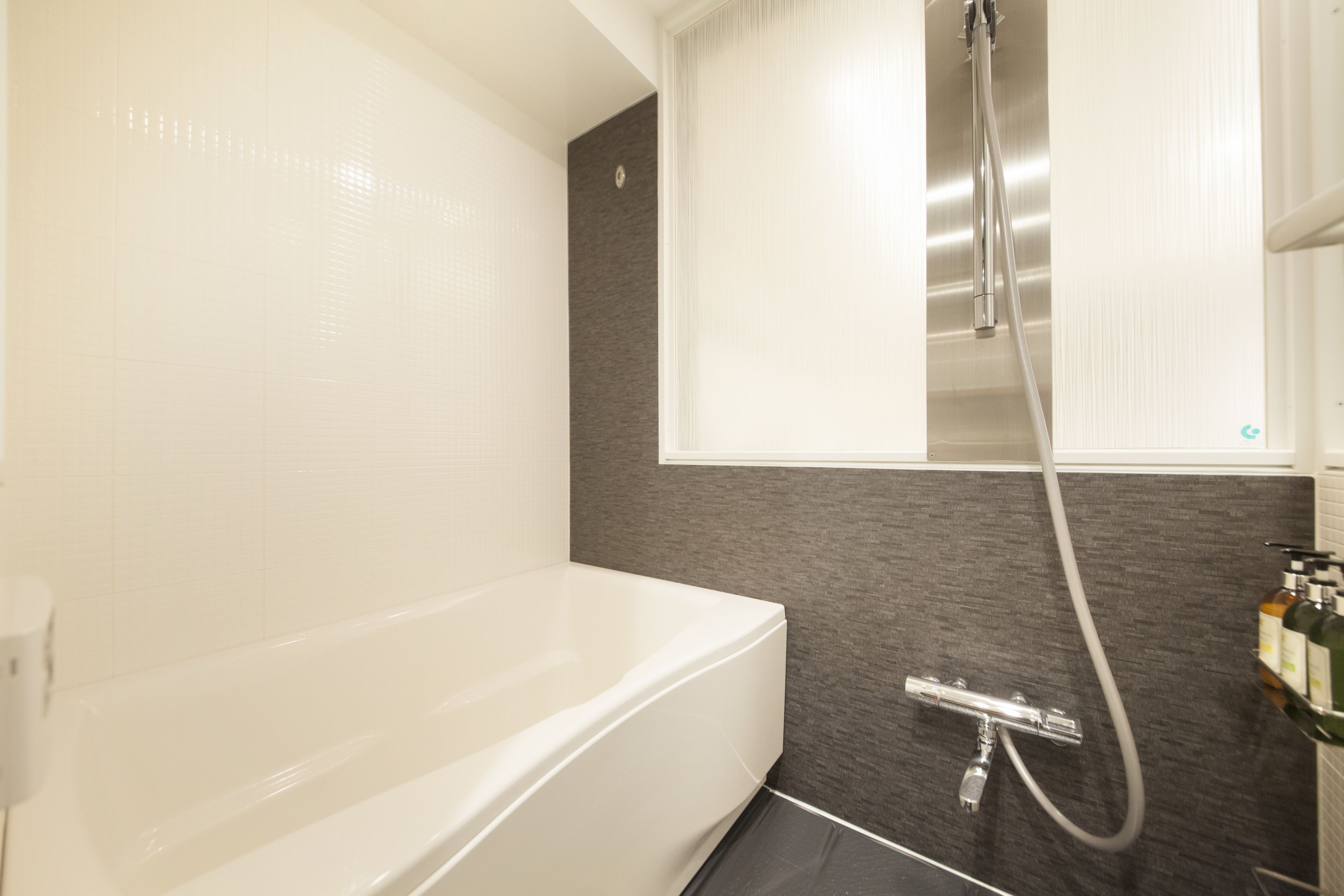 separate bathtub and shower, free toiletries, hair dryer, slippers