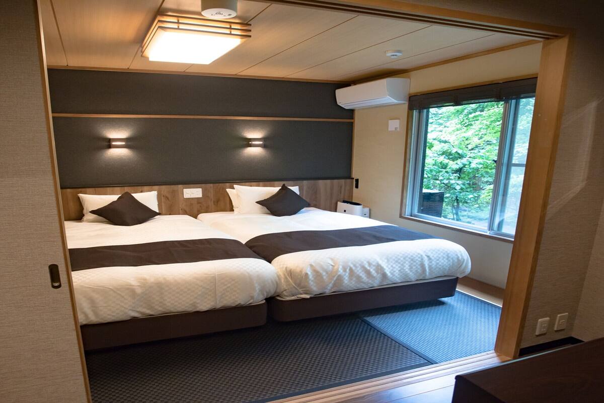 modern western style superior room with open-air bath, non smoking | 2 bedrooms, premium bedding, in-room safe, desk